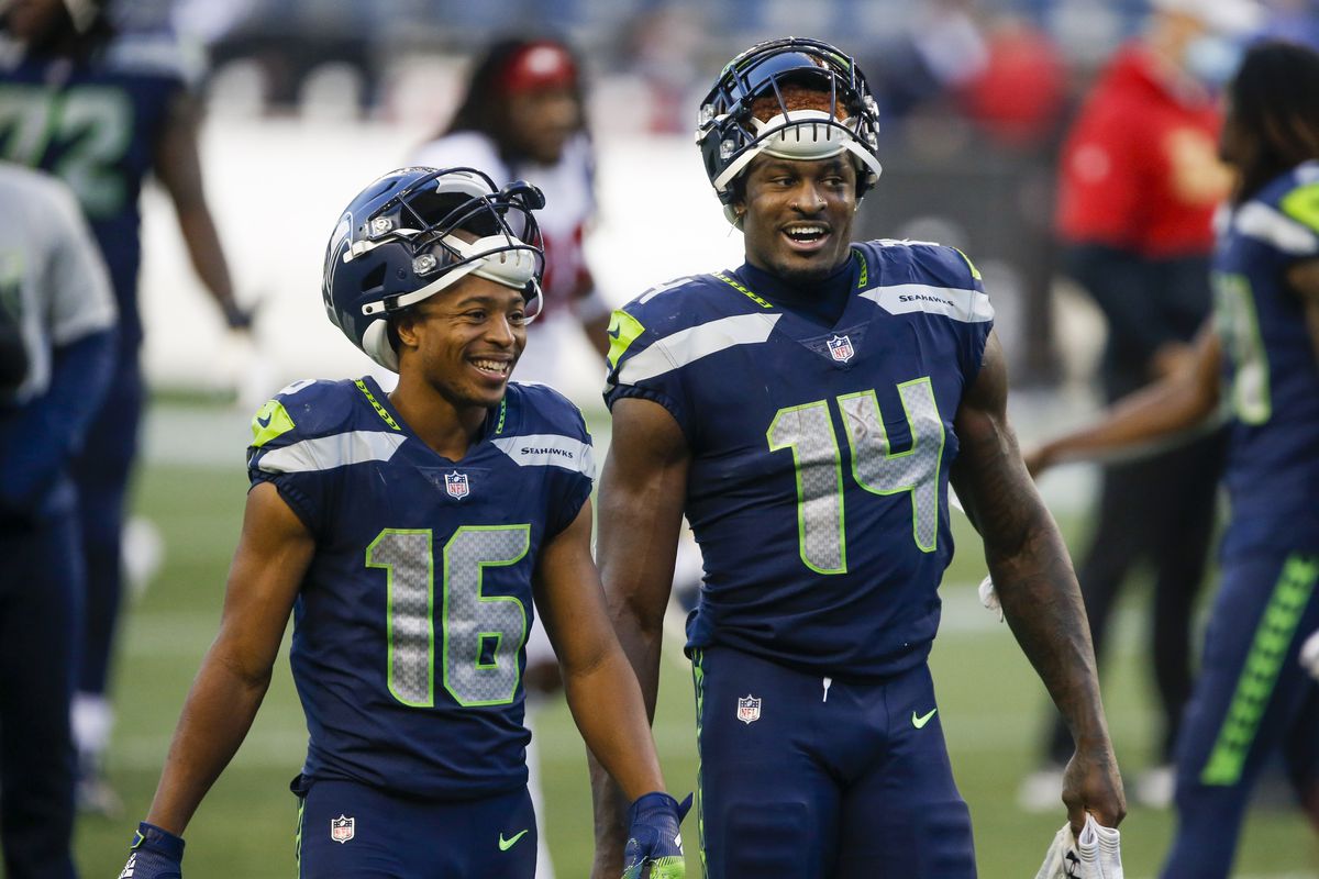 Tyler Lockett and DK Metcalf walking side by side.